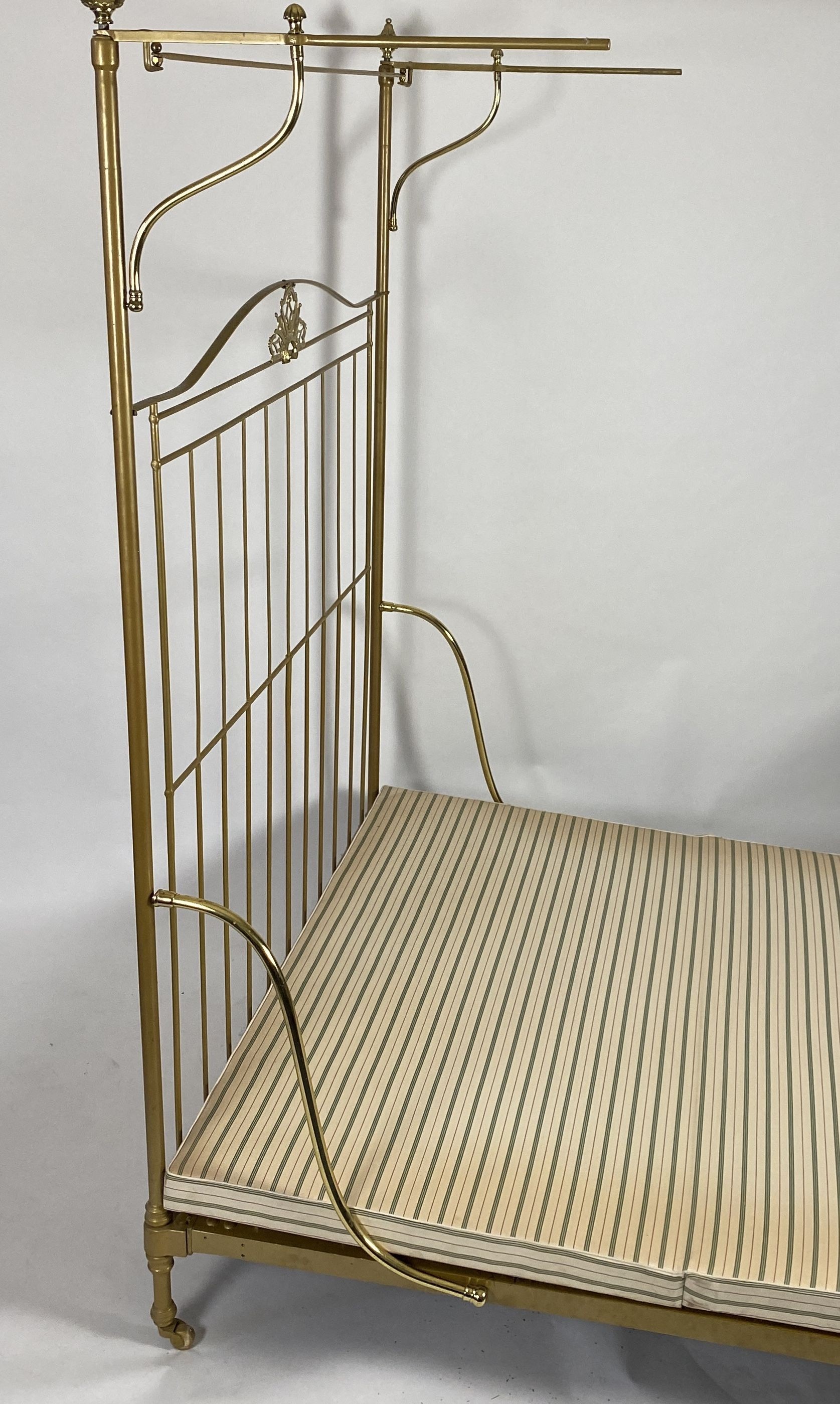 A Victorian R.W.Winfield & Co. brass half tester bed frame, W 168cm, L 215cm